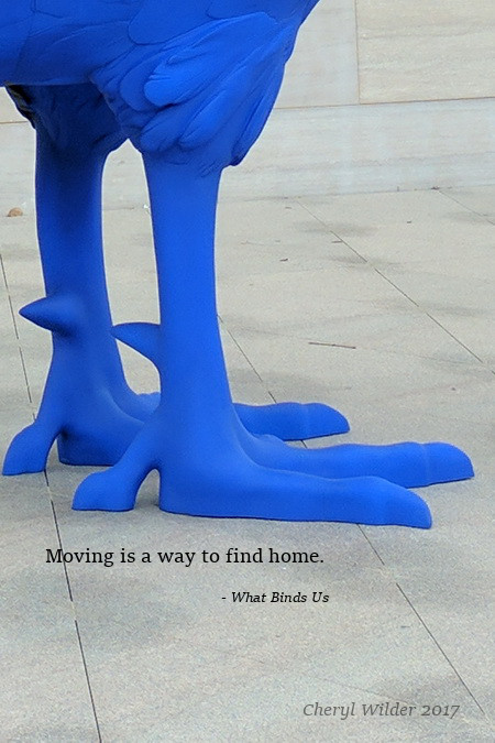 statue of blue rooster's feet at art museum